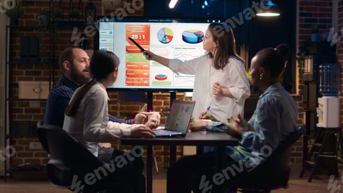 Preview: Company employee explaining analytics research results in business meeting