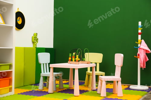 Preview: Stylish playroom interior with table and chairs