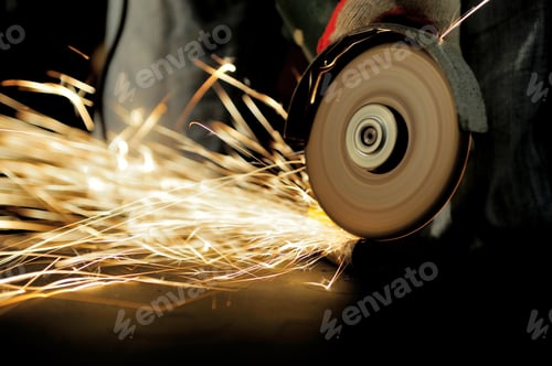 Preview: Worker cutting metal with grinder