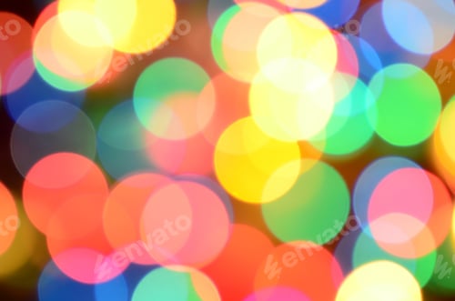 Preview: Blurred festive colorful lights over black useful as background
