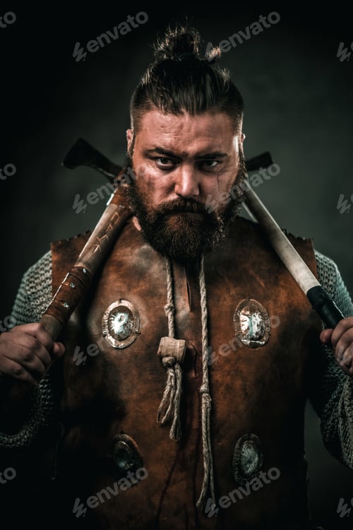 Preview: Viking with cold weapon in a traditional warrior clothes