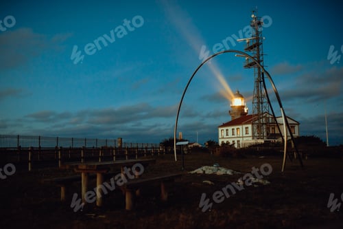 Preview: Road and lighthouse in evening