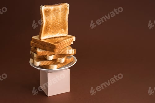 Preview: Heap of toasts on pedestal on brown