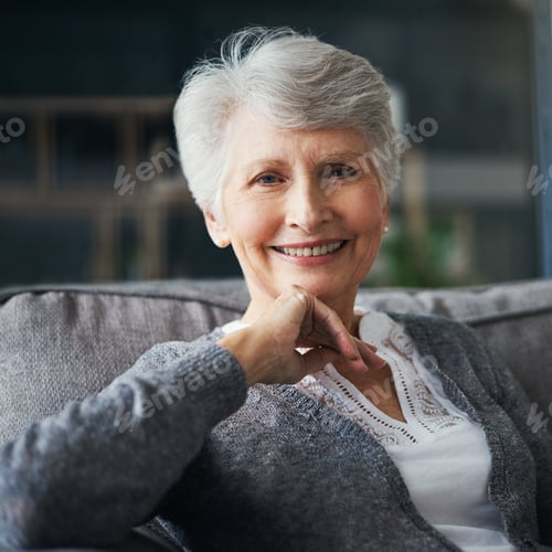 Preview: Right here is where Im happiest. Portrait of a senior woman relaxing on the sofa at home.