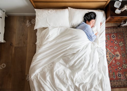 Preview: Asian woman on the bed sleeping by herself