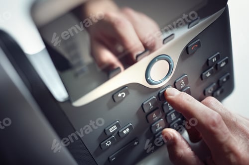 Preview: Dialing a telephone in the office