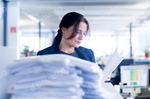Preview: Administrative staff working alone in office