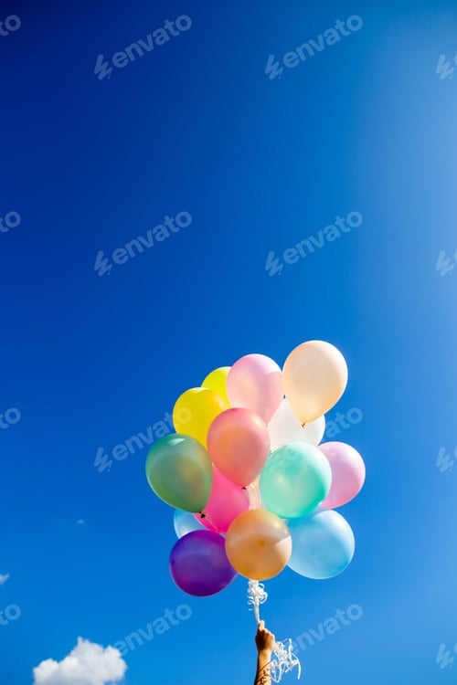 Preview: Colorful balloons done with a retro instagram filter effect.
