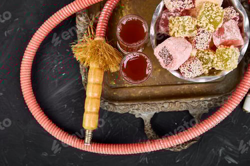 Preview: Set of various Turkish delight in bowl on metal tray near hookah tube