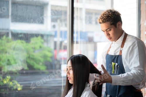 Preview: woman client person having a process to making treatment a hair with hairdresser in beauty salon