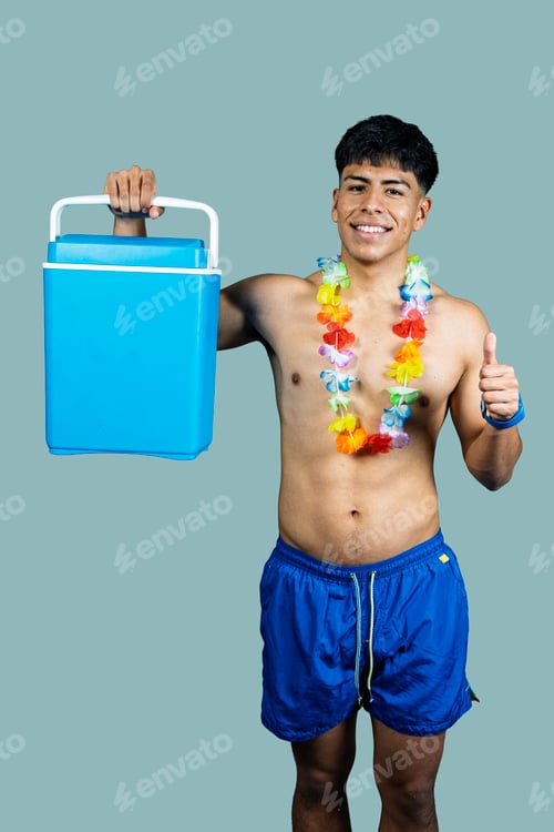 Preview: Young latino man holding cooler and gesturing thumbs up, ready for summer vacation