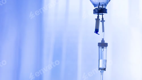 Preview: Health care background of IV drip chamber closeup with copy-space