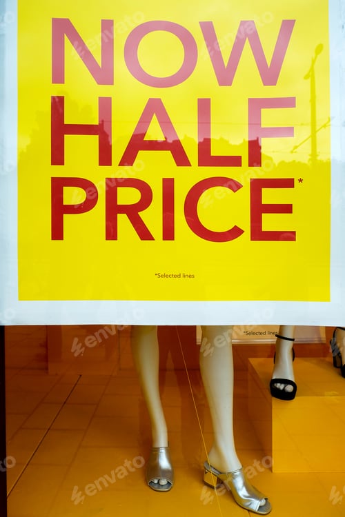 Preview: Retail store sale banner with mannequin legs on window display