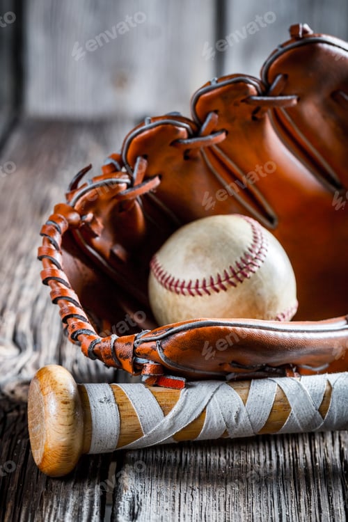 Preview: Old baseball bat and glove with ball
