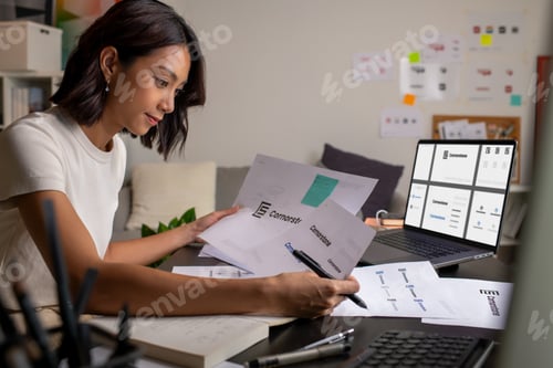 Preview: Asian woman Graphic designer working in office.