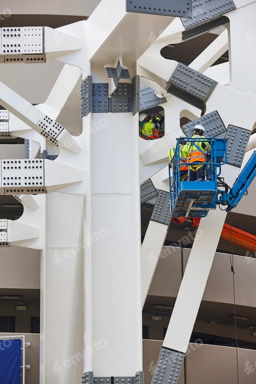 Preview: Workers on a construction site. Engineering and architectural infrastructure. Safety