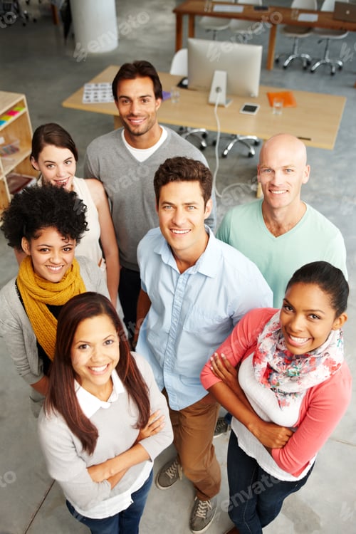 Preview: High angle view portrait of a group of multi-ethnic people in a work environment