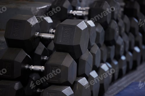 Preview: Fitness, workout and dumbbells in empty gym for exercise, bodybuilding development and sports train