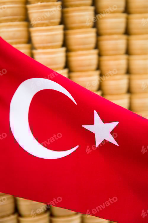 Preview: Stack of empty waffle ice cream cones in Istanbul with turkish flag