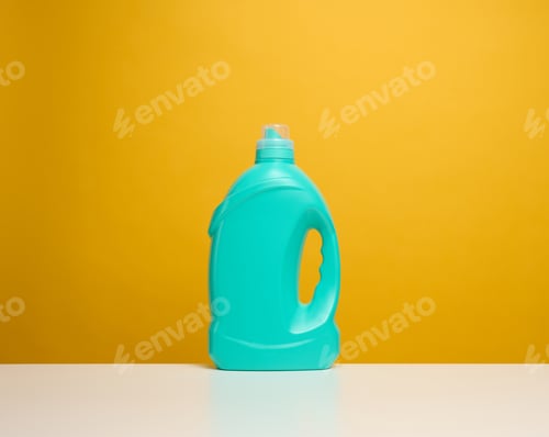 Preview: Plastic blue bottle with liquid detergent stand on a white table