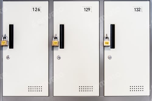 Preview: Locked white lockers with padlocks