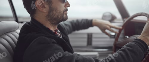 Preview: Man In Retro Clothes Driving Vintage American Car.