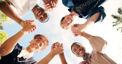 Preview: Friends, portrait and holding hands outdoor for teamwork, synergy or solidarity by sky. Group, face