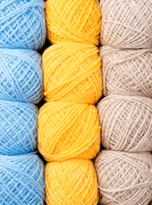 Preview: colorful yarn wool on shopfront