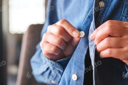 Preview: Buttoning a Blue Denim Shirt for Casual Style
