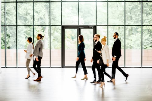 Preview: Business people walking indoors