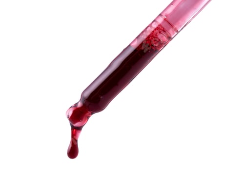 Preview: serum pipette with a falling drop on white background