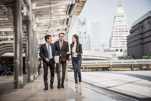 Preview: Businessmen talk about work while meeting outside, business partners work together.