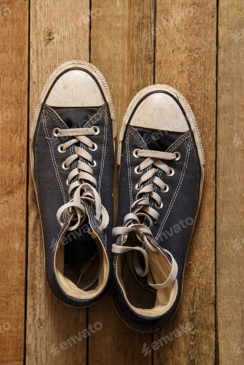 Preview: Gumshoes on wooden background