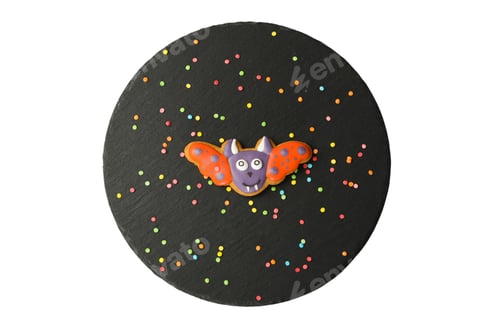 Preview: Halloween cake with bat and sprinkles, isolated on white