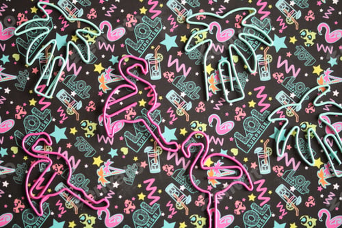 Preview: Colourful flat lay with flamingos and palm trees