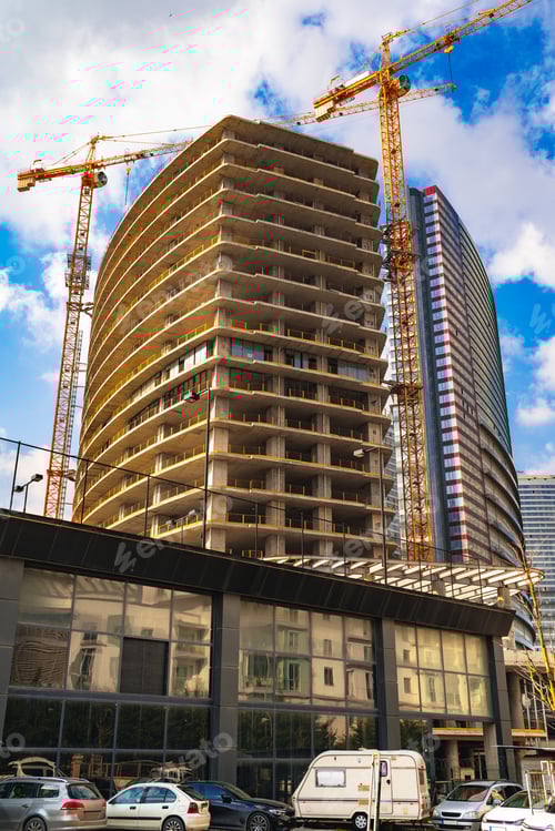 Preview: Building construction site against blue sky in Istanbul.