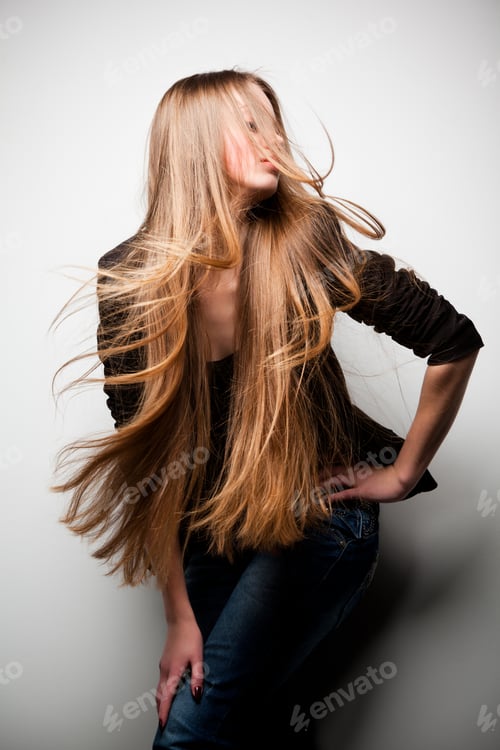 Preview: Girl posing with long flowing hair