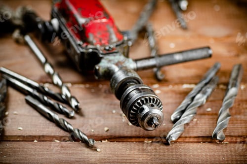 Preview: Vintage Electric Drill and Drill Bits on Wood