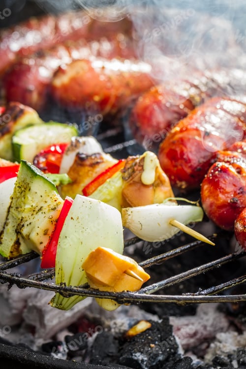 Preview: Sausages and skewers on the grill