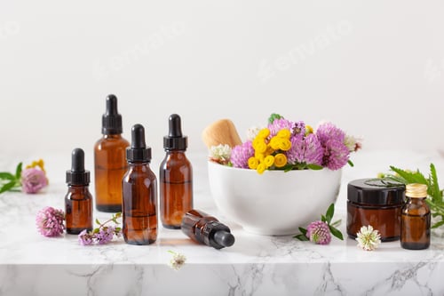 Preview: medical flowers herbs in mortar essential oils in bottles. alter