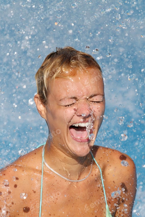 Preview: Beautiful young woman at a pool