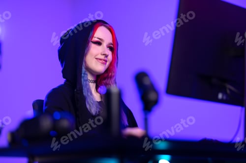 Preview: Confident Female Gamer Engaged in Competitive Gaming