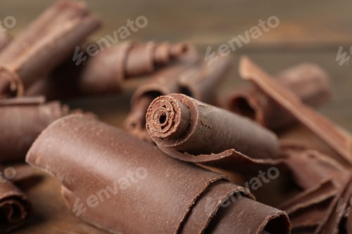 Preview: Chocolate curls for decor on table, closeup