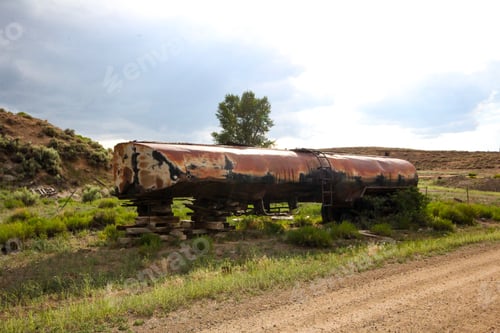 Preview: Old, rusted and broken down liquid tanker trailer on a roadside near Gunnison, Colorado, USA