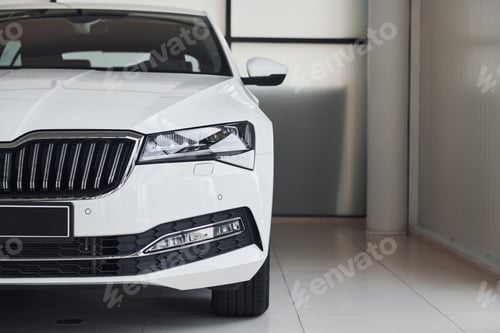 Preview: Particle view of modern brand new white car. Front part of vehicle