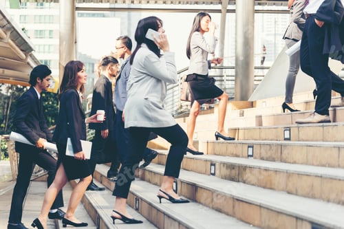 Preview: Team leadership business people walking together city life. Group of business team leader power