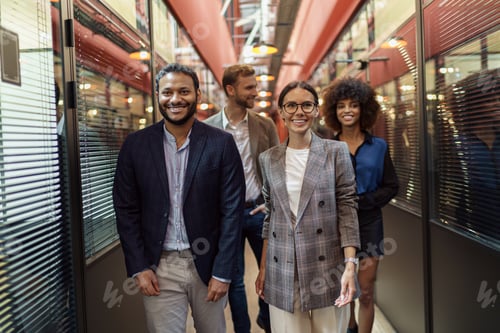Preview: Multiethnic group of business people talking in office during break. Teamwork concept