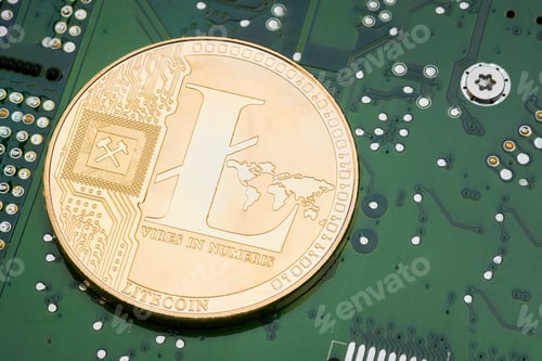 Preview: golden metallic litecoin on electronic circuit motherboard.crypto currency mining