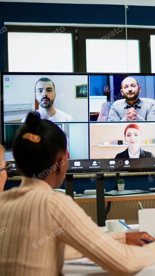 Preview: Emplyees workers having webcam conference with coworkers speaking on video call