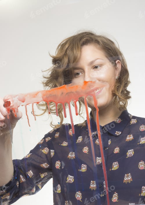Preview: Beautiful Girl Painting, Shot From Low Angle, Thought Artist Table Glass.